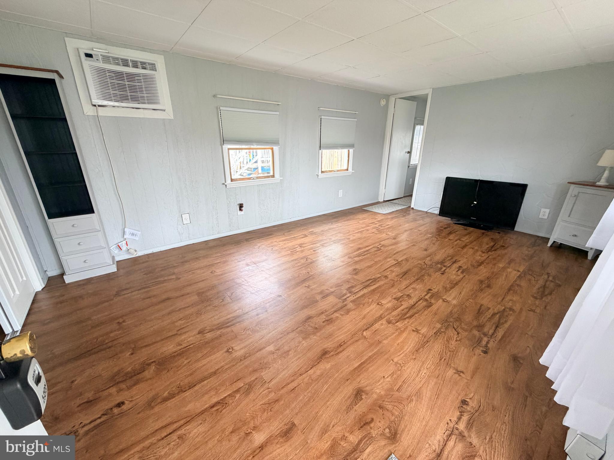 217 Oak Street Wiconisco, PA 17048 - Photo 9 of 31 a view of a bedroom with wooden floor and window