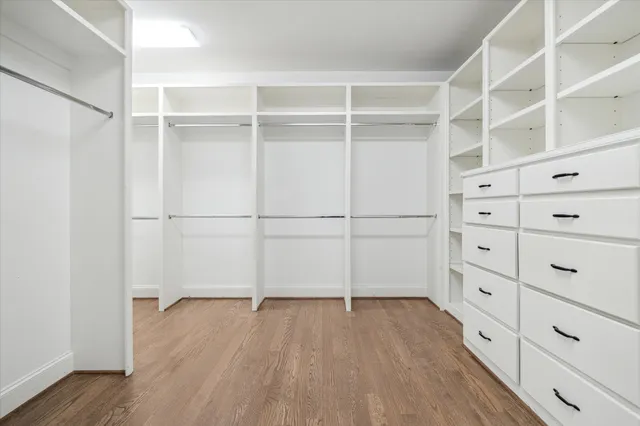 a view of an empty walk in closet