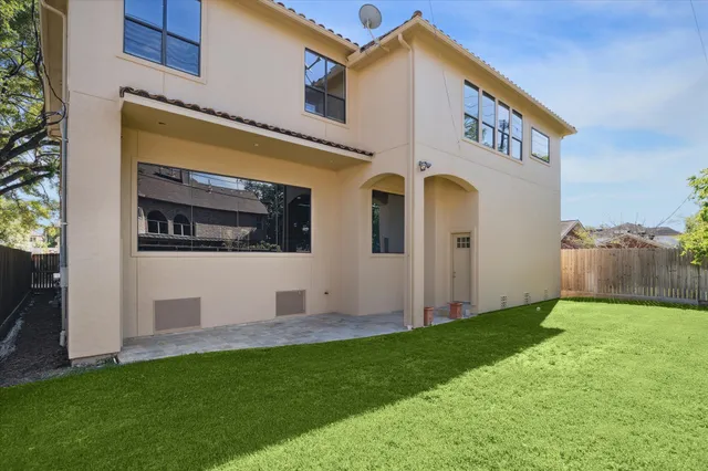 a view of front door of house with yard