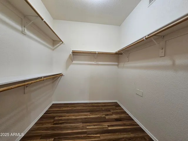 a view of a room with racks on the wall