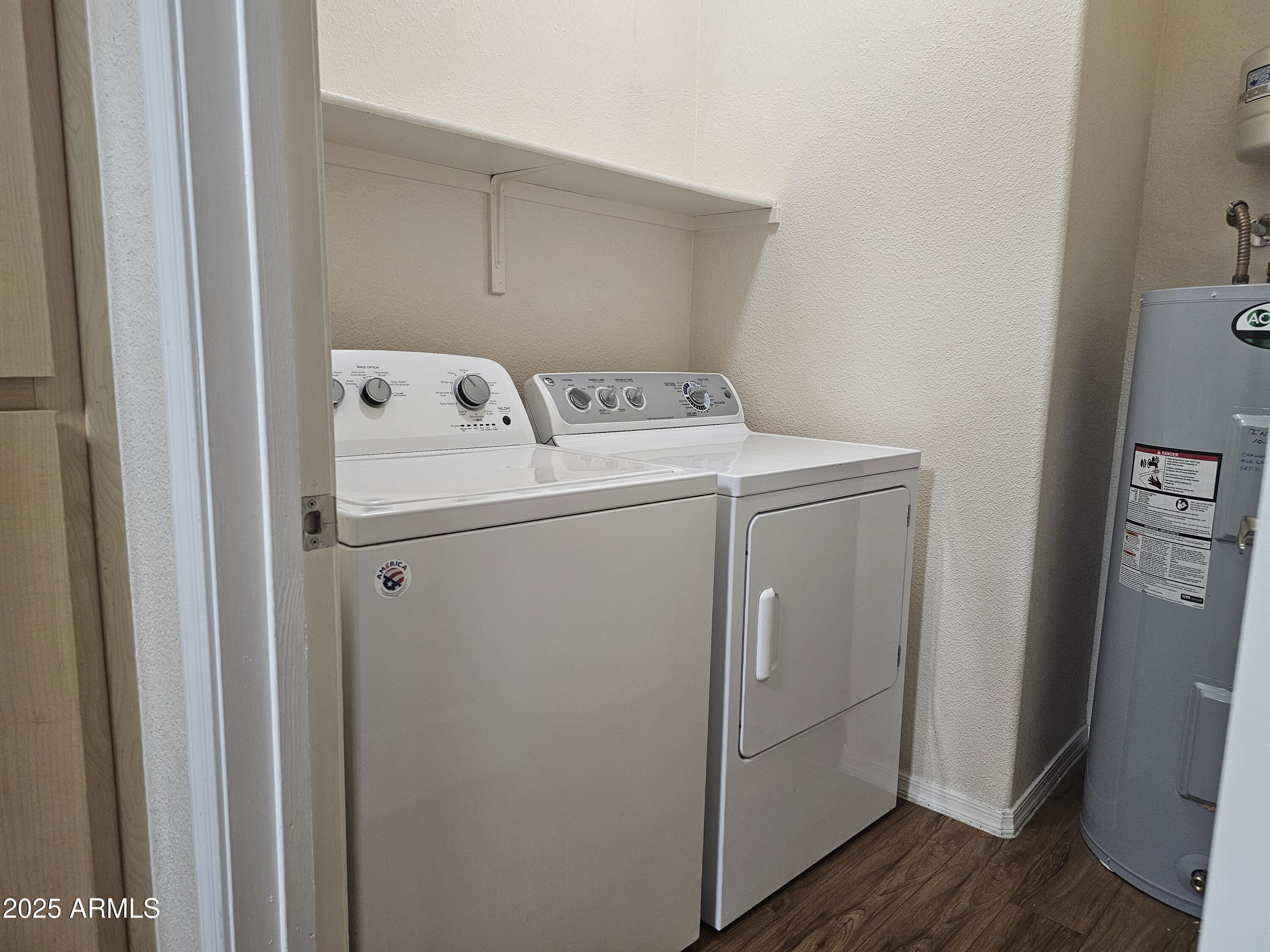 18416 North Cave Creek Road, Unit 1011 Phoenix, AZ 85032 - Photo 8 of 11 a utility room with dryer and washer