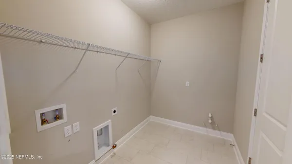 a view of a room with racks on the wall