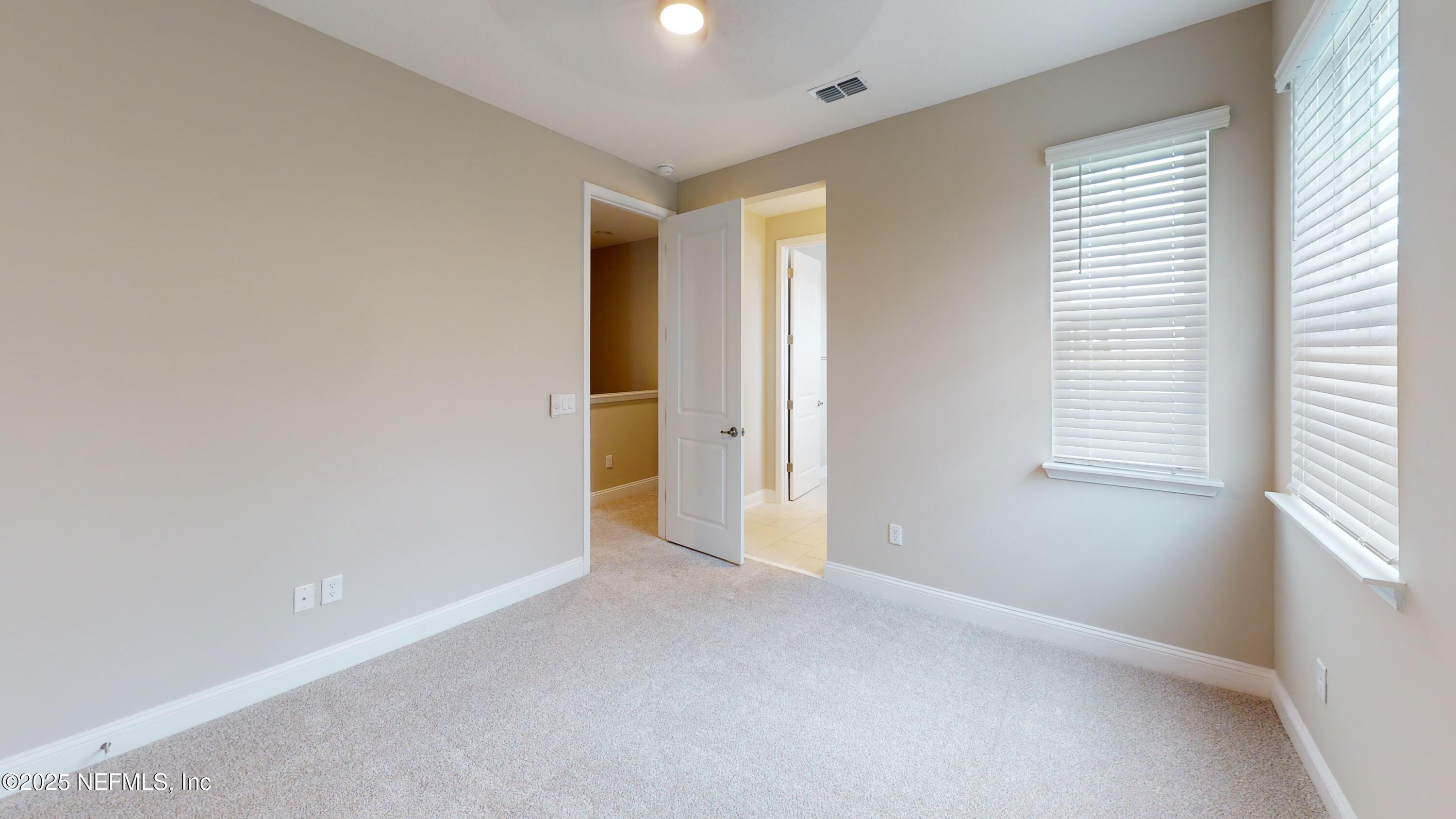 511 Marquesa Circle St. Johns, FL 32259 - Photo 32 of 44 an empty room with windows