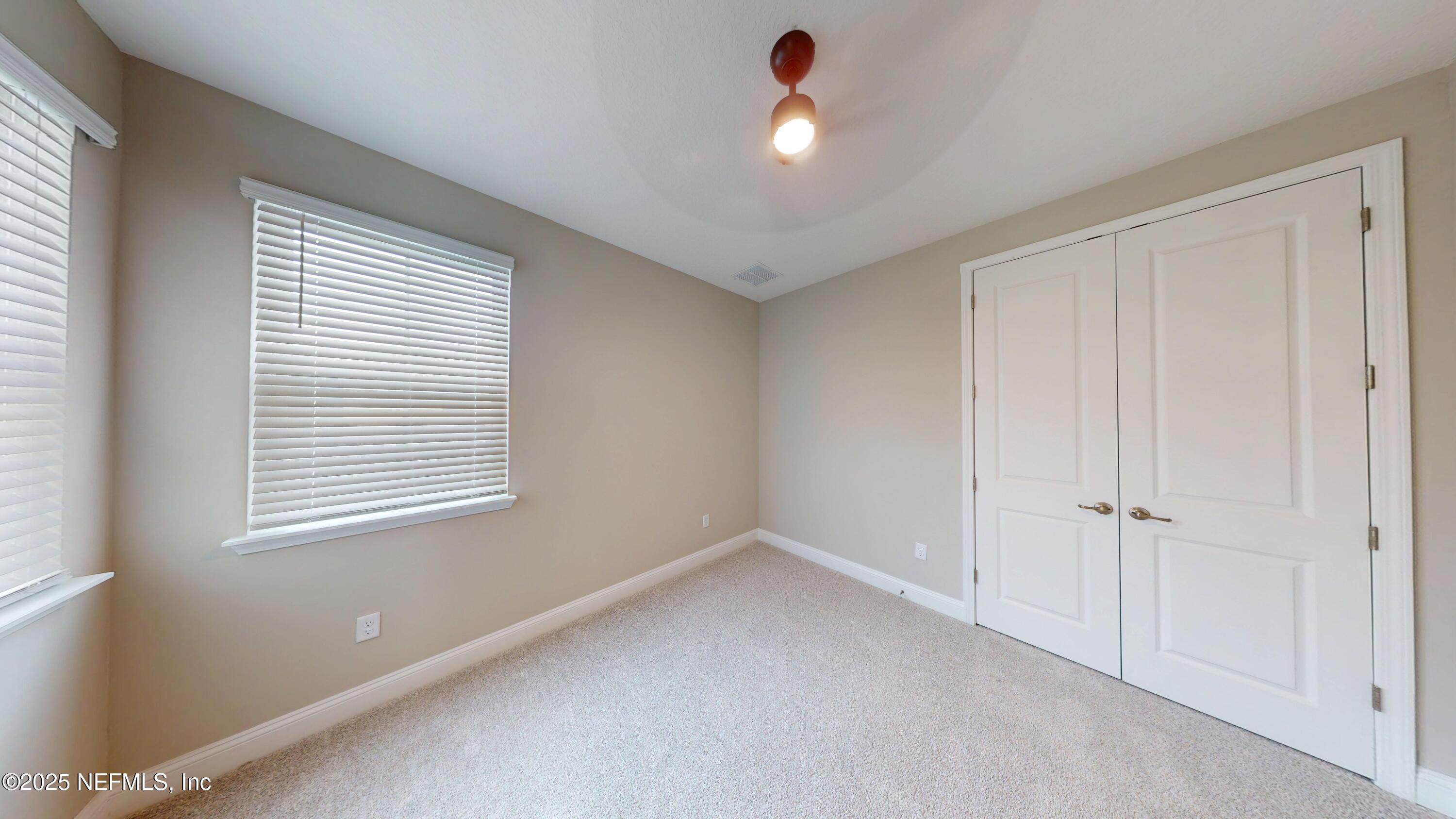 511 Marquesa Circle St. Johns, FL 32259 - Photo 35 of 44 a view of an empty room with a window