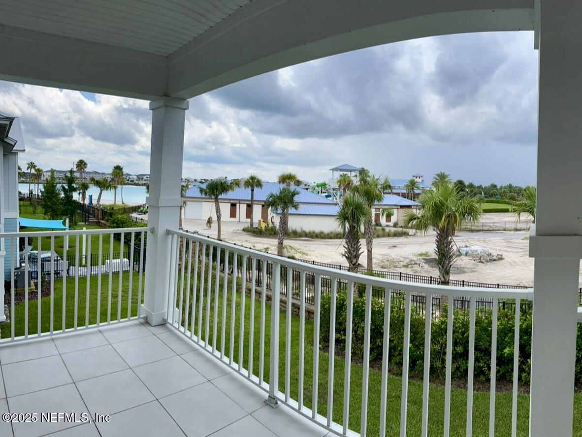 511 Marquesa Circle St. Johns, FL 32259 - Photo 37 of 44 a view of a porch and garden