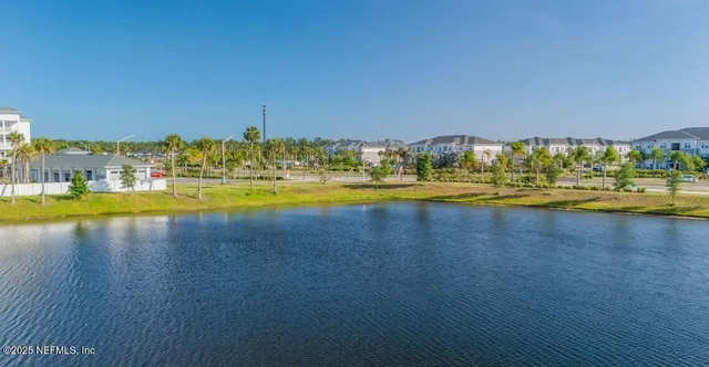 a view of a swimming pool with an ocean view