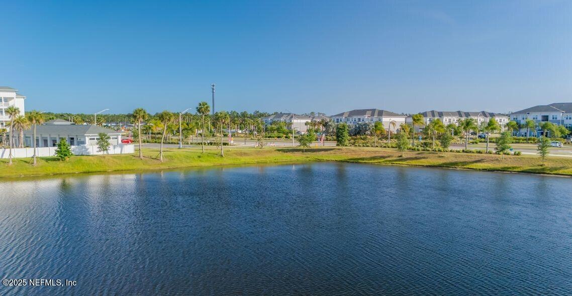 511 Marquesa Circle St. Johns, FL 32259 - Photo 39 of 44 a view of a swimming pool with an ocean view