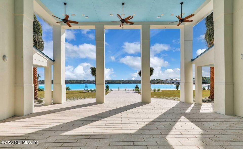511 Marquesa Circle St. Johns, FL 32259 - Photo 42 of 44 a porch with a table and chairs