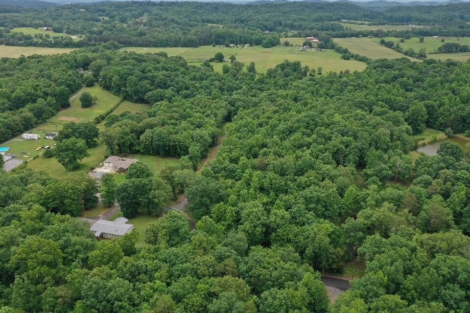 191 County Road 707 Athens, TN 37303 - Photo 3 of 7 an aerial view of residential houses with outdoor space and trees