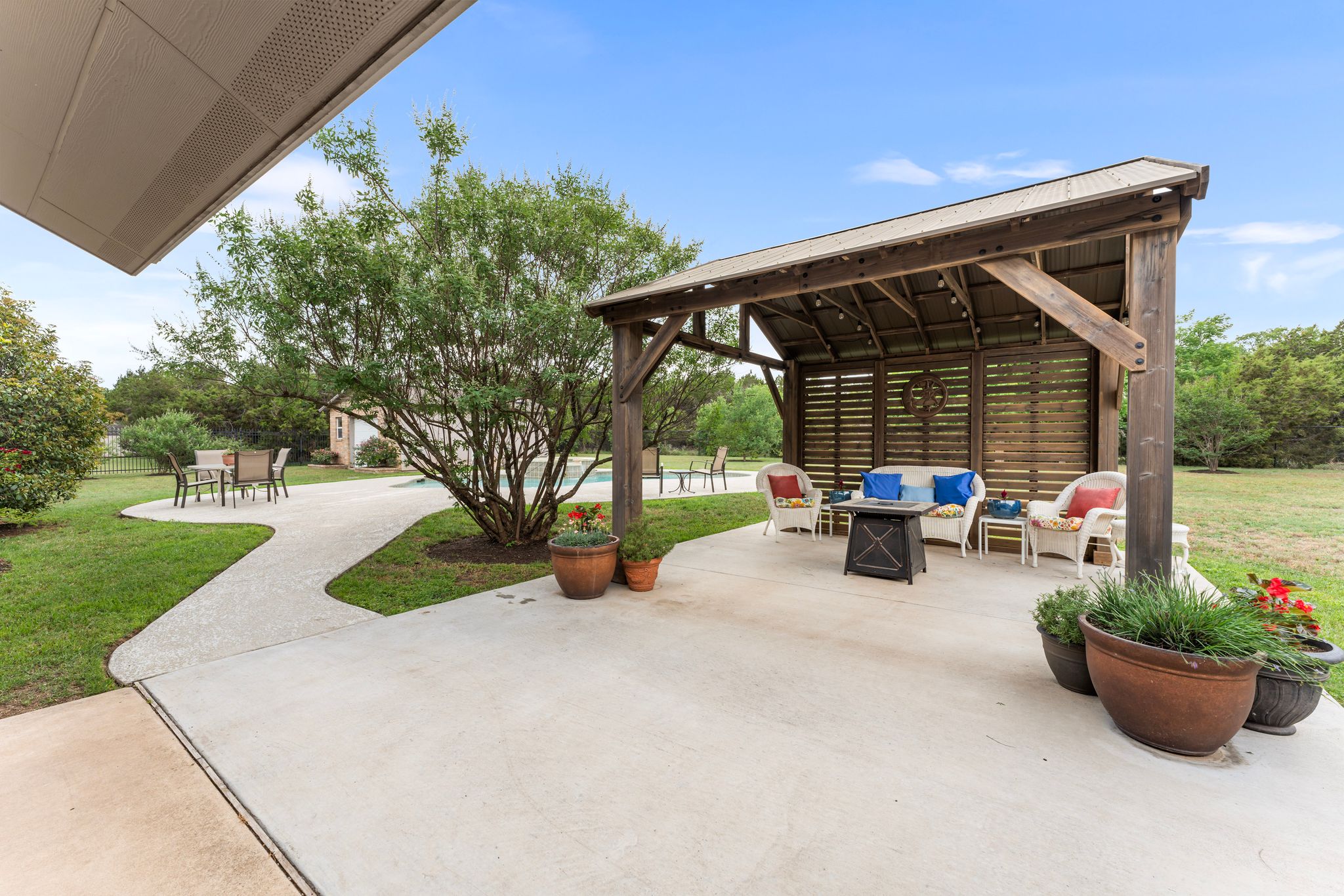 221 Breakaway Road Cedar Park, TX 78613 - Photo 16 of 39 View of patio with a gazebo, an outdoor living space with a fire pit, and an outdoor pool