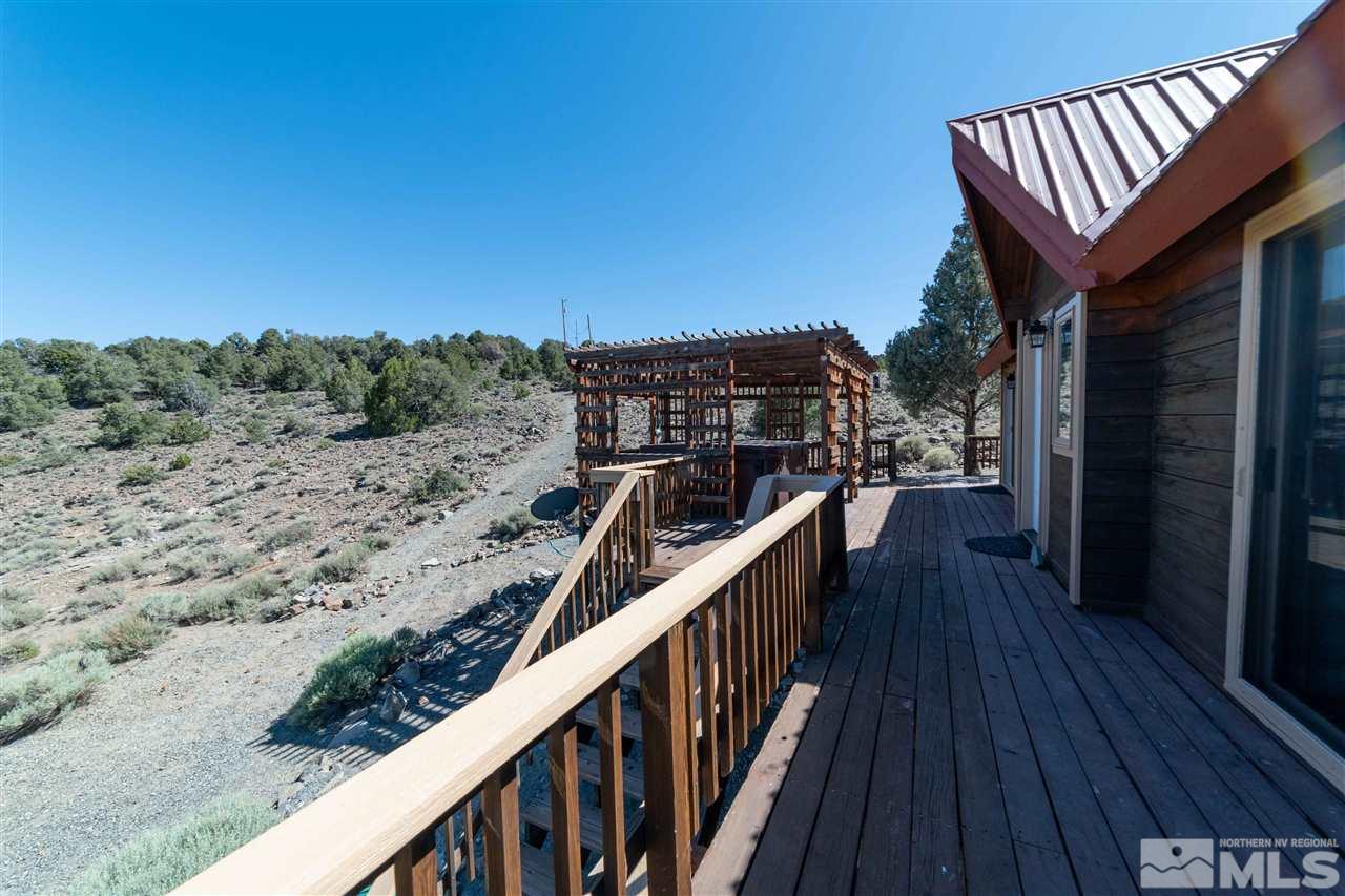 3880 Stovepipe Road Reno, NV 89521 - Photo 31 of 40 a view of balcony with wooden floor and fence
