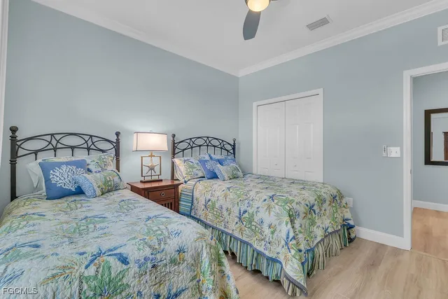 a bedroom with double bed and a window