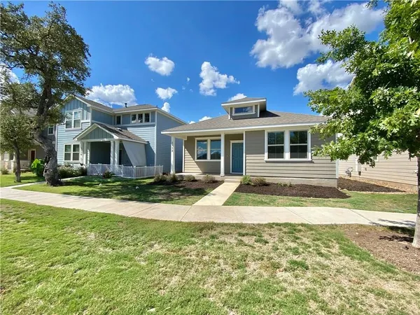 a house view with a garden space