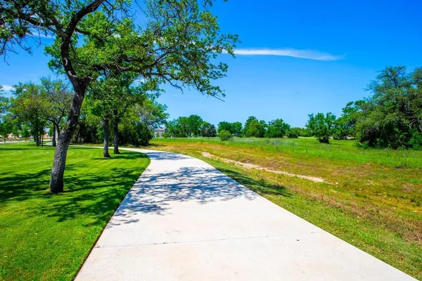 a view of a golf course with a garden