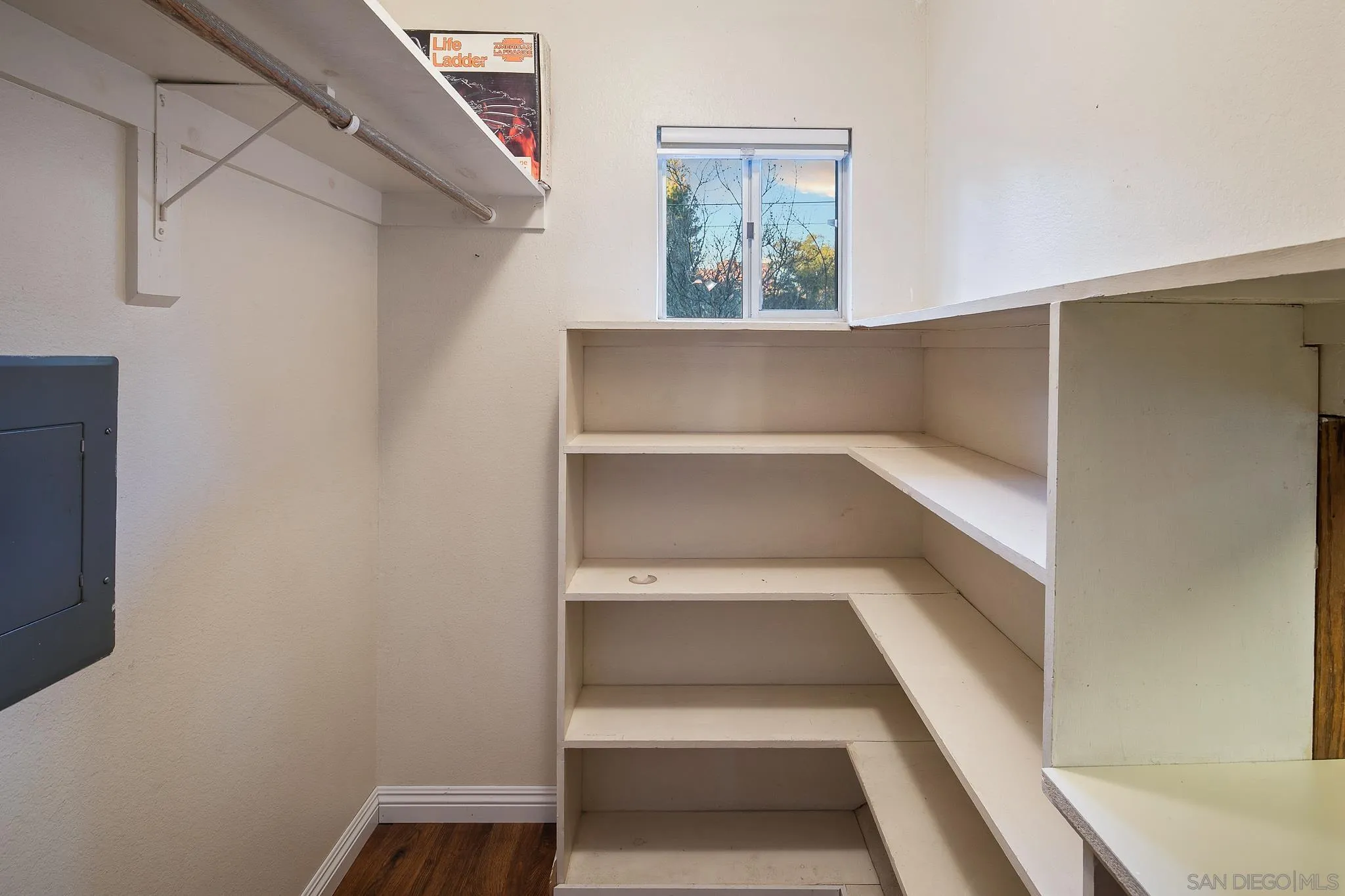 1528 South Grade Road Alpine, CA 91901 - Photo 54 of 65 a view of walk in closet with empty racks