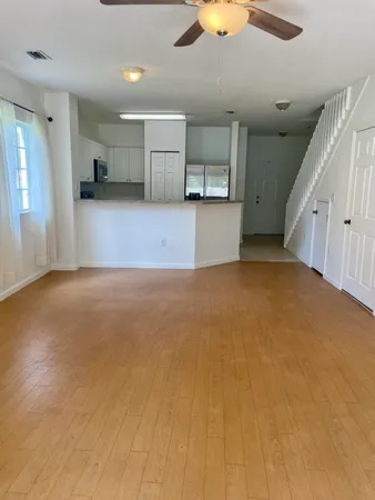 a view of a kitchen with a sink