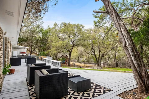 a view of a swimming pool with an outdoor space