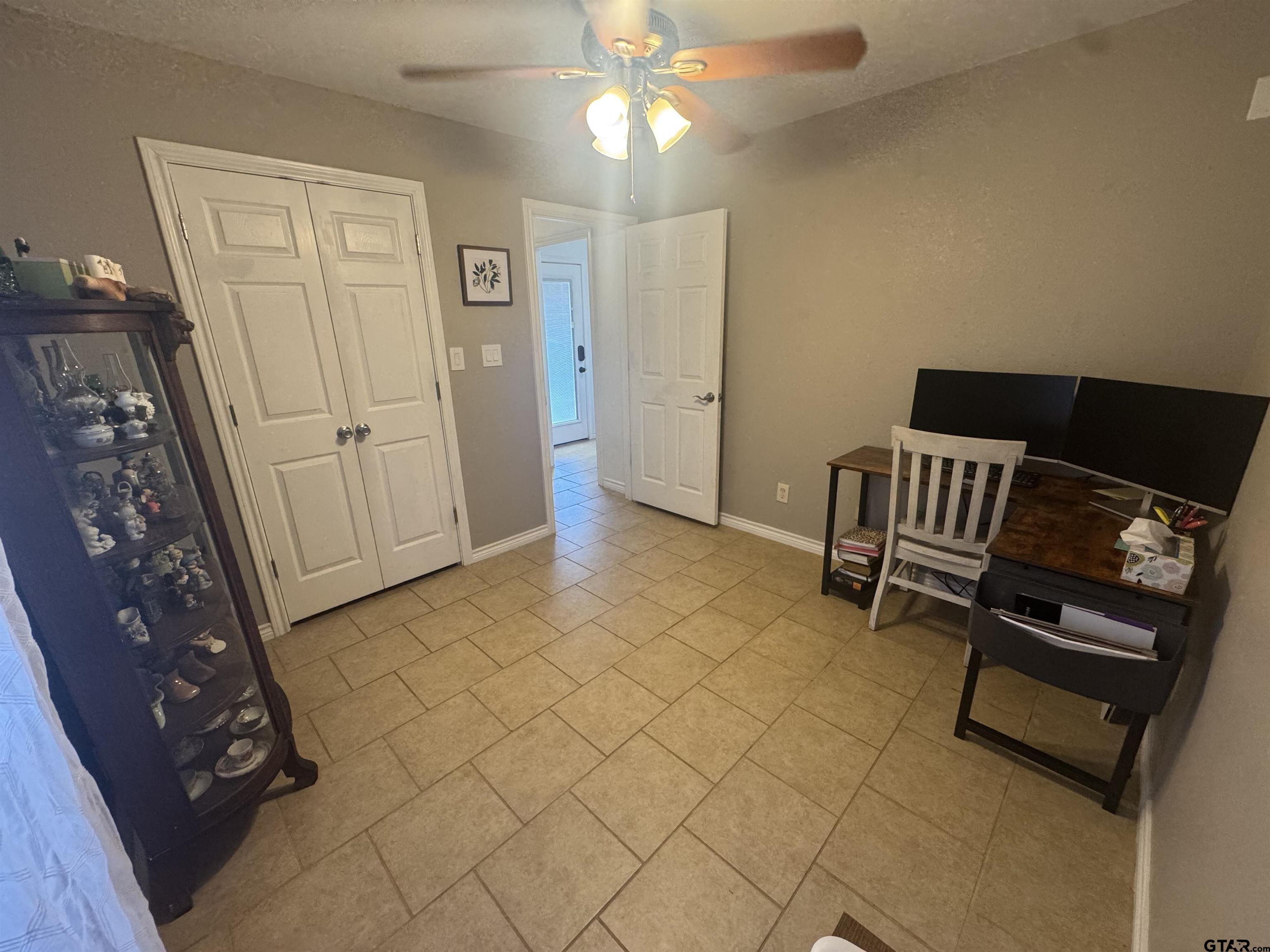 508 County Road 2147 Troup, TX 75789 - Photo 18 of 24 wooden floor in an empty room with a window