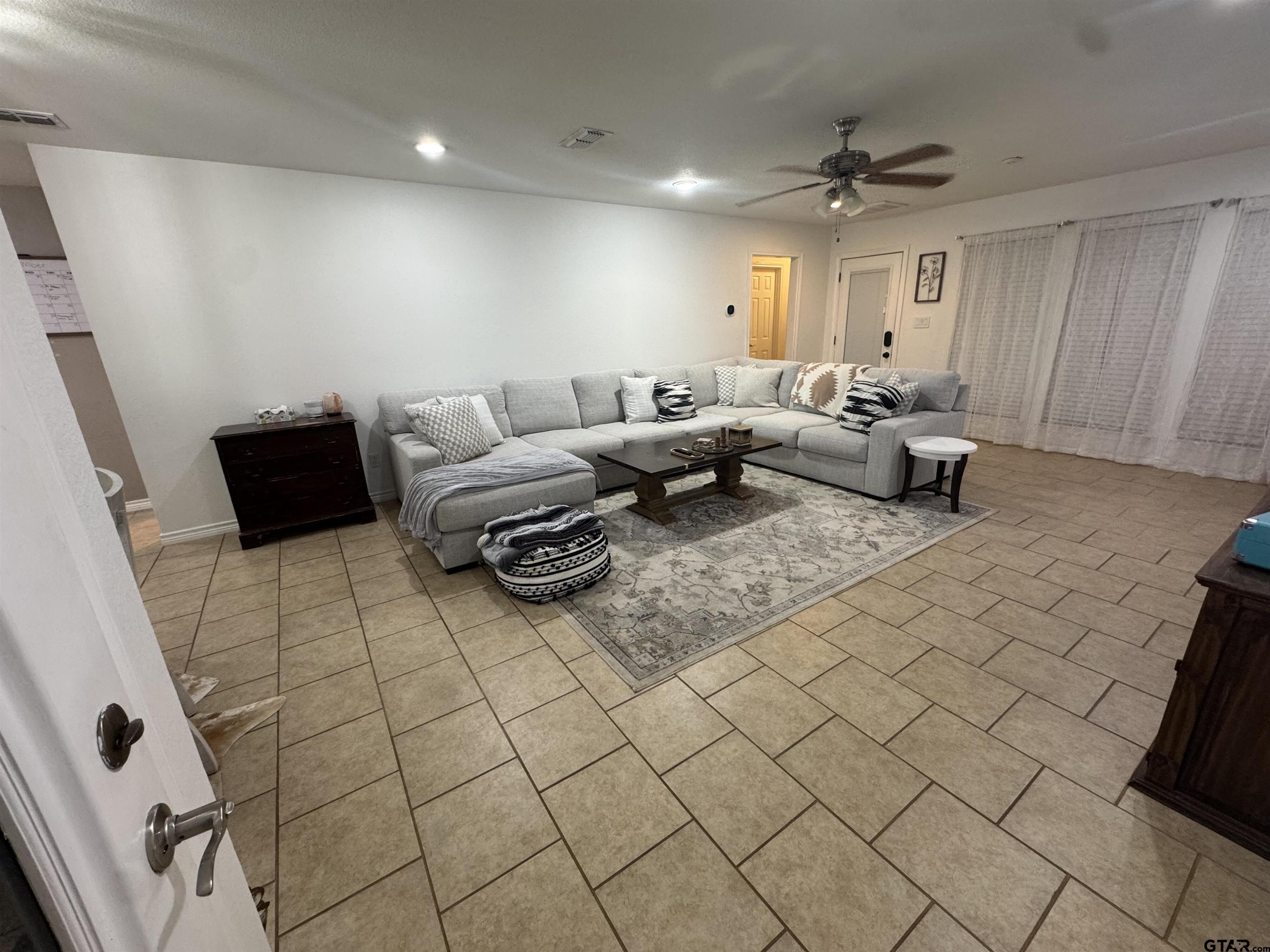 508 County Road 2147 Troup, TX 75789 - Photo 6 of 24 a living room with furniture and a rug