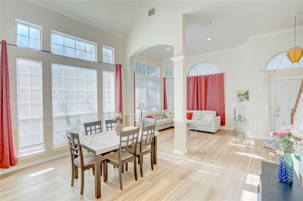 9504 Rodeo Drive Irving, TX 75063 - Photo 14 of 35 a view of a dining room with furniture and a large window