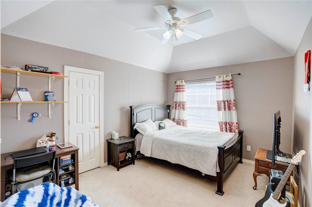 9504 Rodeo Drive Irving, TX 75063 - Photo 22 of 35 a bedroom with a bed and a window