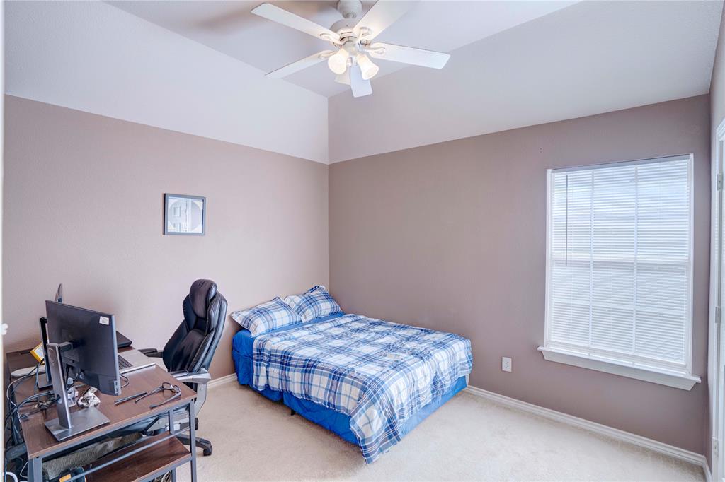 9504 Rodeo Drive Irving, TX 75063 - Photo 30 of 35 a bedroom with a bed and a window