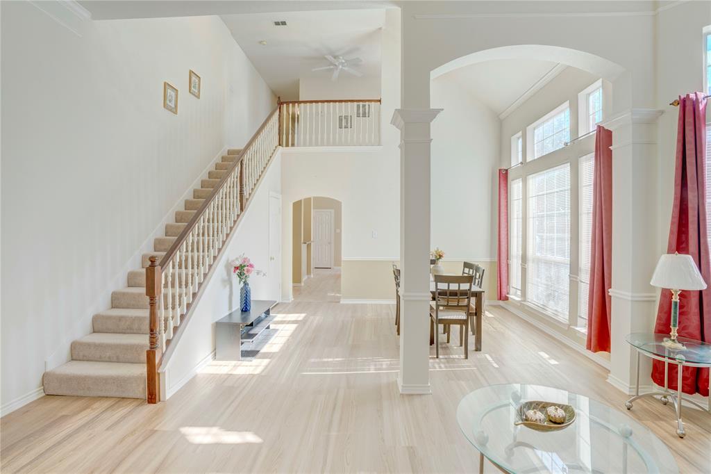 9504 Rodeo Drive Irving, TX 75063 - Photo 4 of 35 a view of entryway and hall with wooden floor