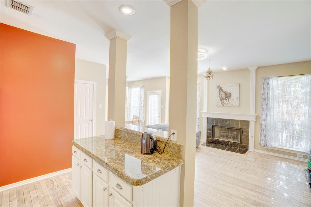9504 Rodeo Drive Irving, TX 75063 - Photo 10 of 35 a bathroom with a sink double vanity and a mirror