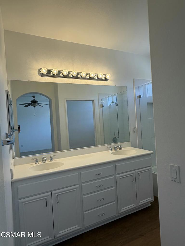 1719 Watercrest Way Simi Valley, CA 93065 - Photo 12 of 26 a bathroom with a sink and a mirror