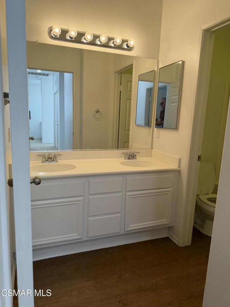 1719 Watercrest Way Simi Valley, CA 93065 - Photo 16 of 26 a bathroom with a sink and a mirror