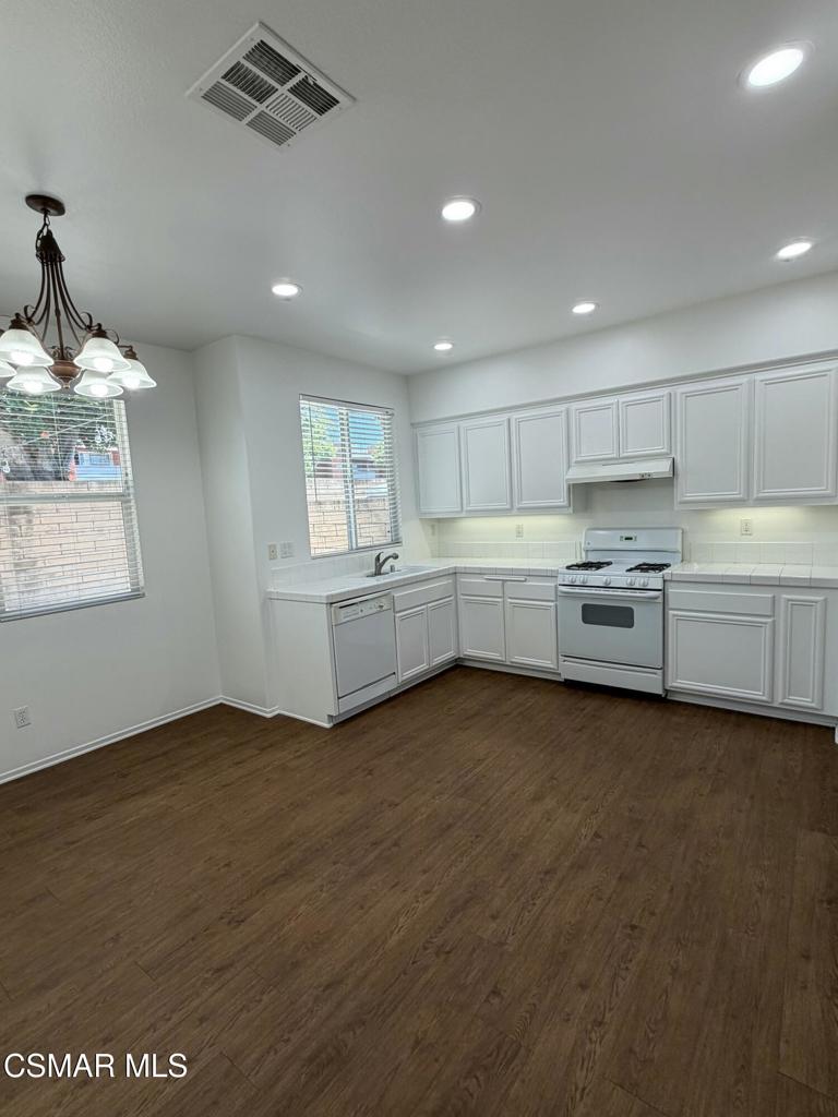 1719 Watercrest Way Simi Valley, CA 93065 - Photo 2 of 26 a view of an empty room with window and wooden floor