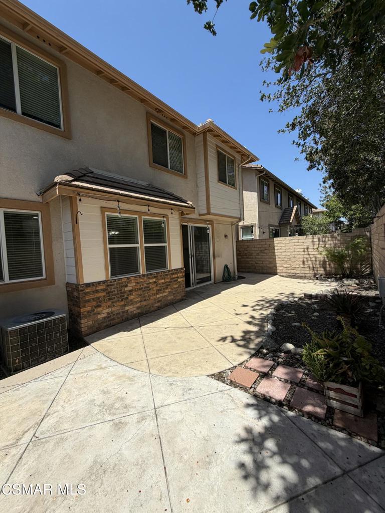 1719 Watercrest Way Simi Valley, CA 93065 - Photo 21 of 26 a front view of a house with a yard
