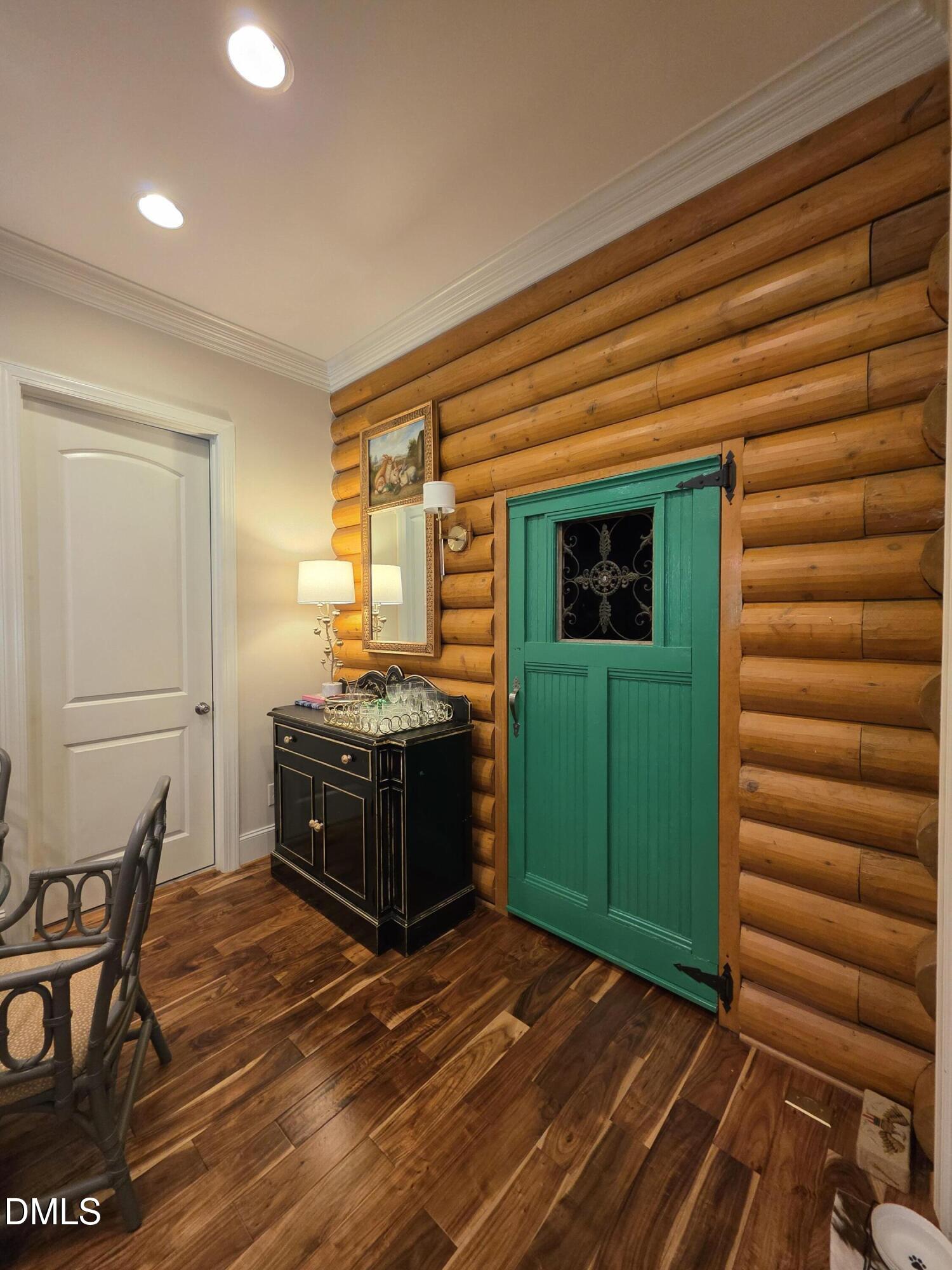 413 Johnson Town Road Zebulon, NC 27597 - Photo 15 of 42 a room with a chair and a dresser
