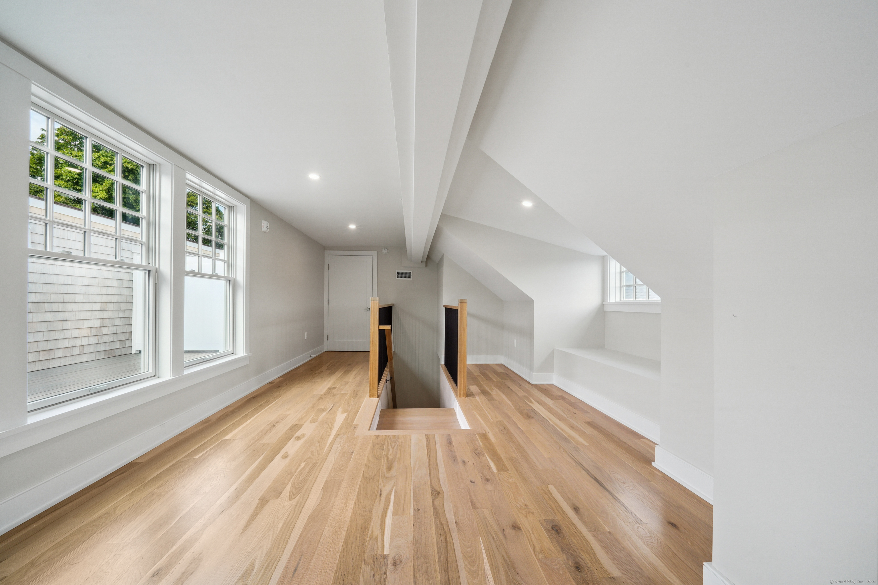 8 Husted Lane, Unit 2D New Canaan, CT 06840 - Photo 15 of 18 a view of entryway with wooden floor