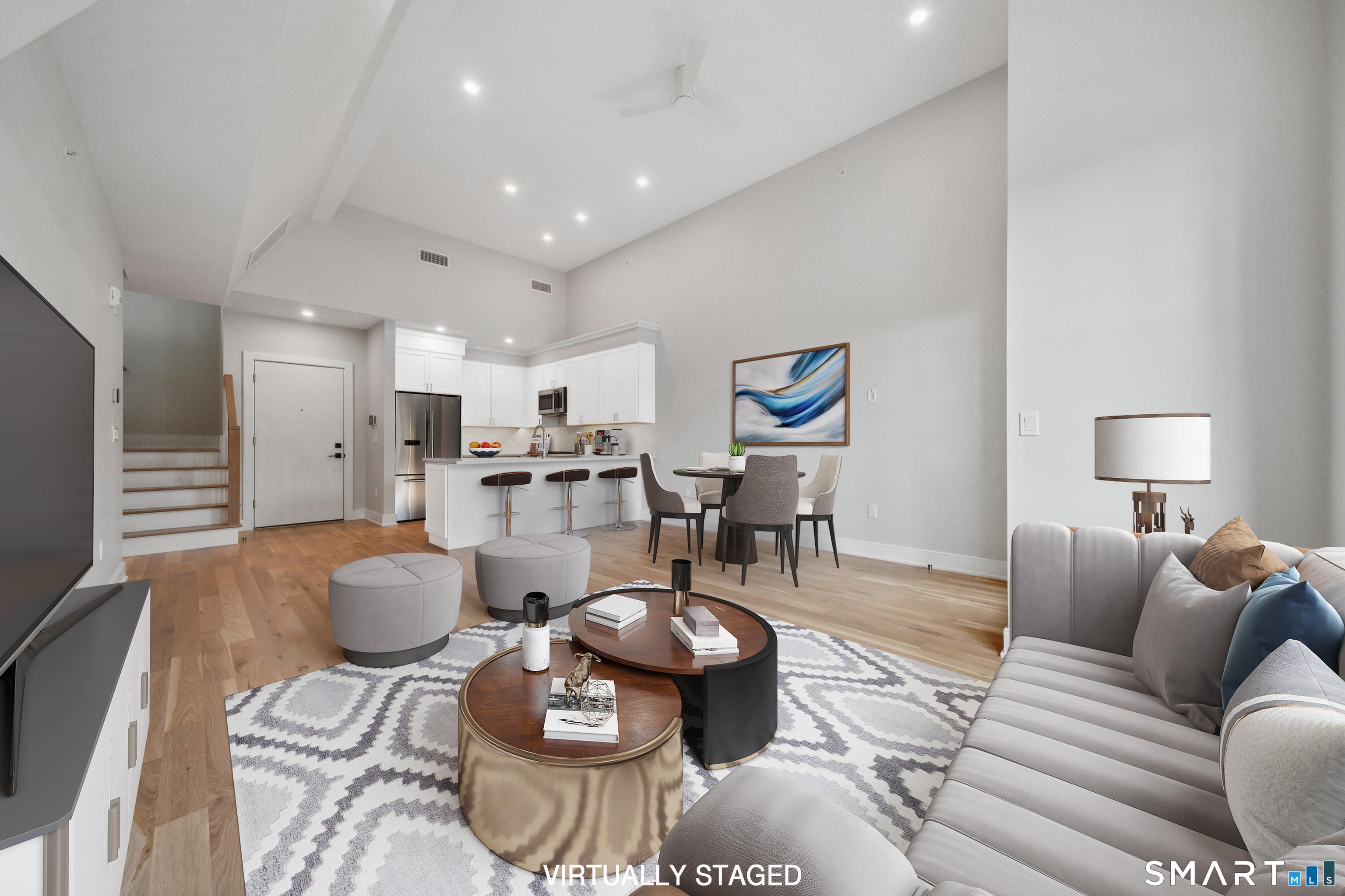 8 Husted Lane, Unit 2D New Canaan, CT 06840 - Photo 4 of 18 a living room with furniture and wooden floor