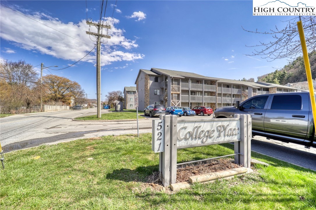 128 Zeb Street, Unit A304 Boone, NC 28607 - Photo 22 of 27 a view of a fountain in the middle of a yard