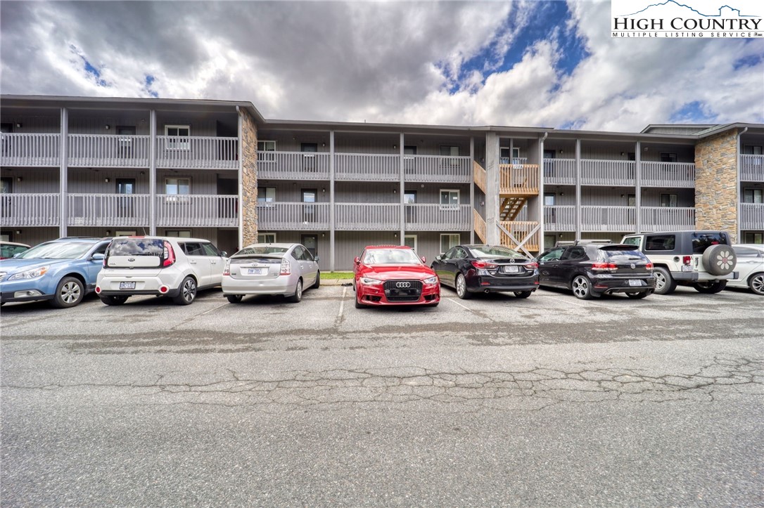 128 Zeb Street, Unit A304 Boone, NC 28607 - Photo 23 of 27 a car parked in front of a building