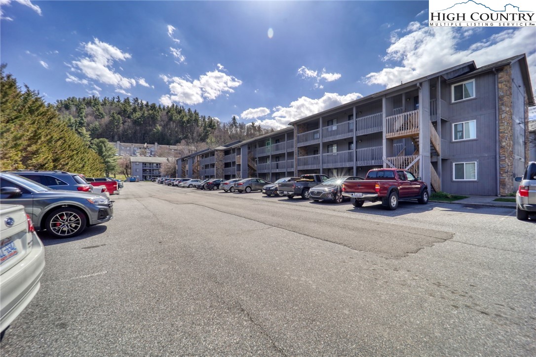 128 Zeb Street, Unit A304 Boone, NC 28607 - Photo 27 of 27 a car parked in front of a building