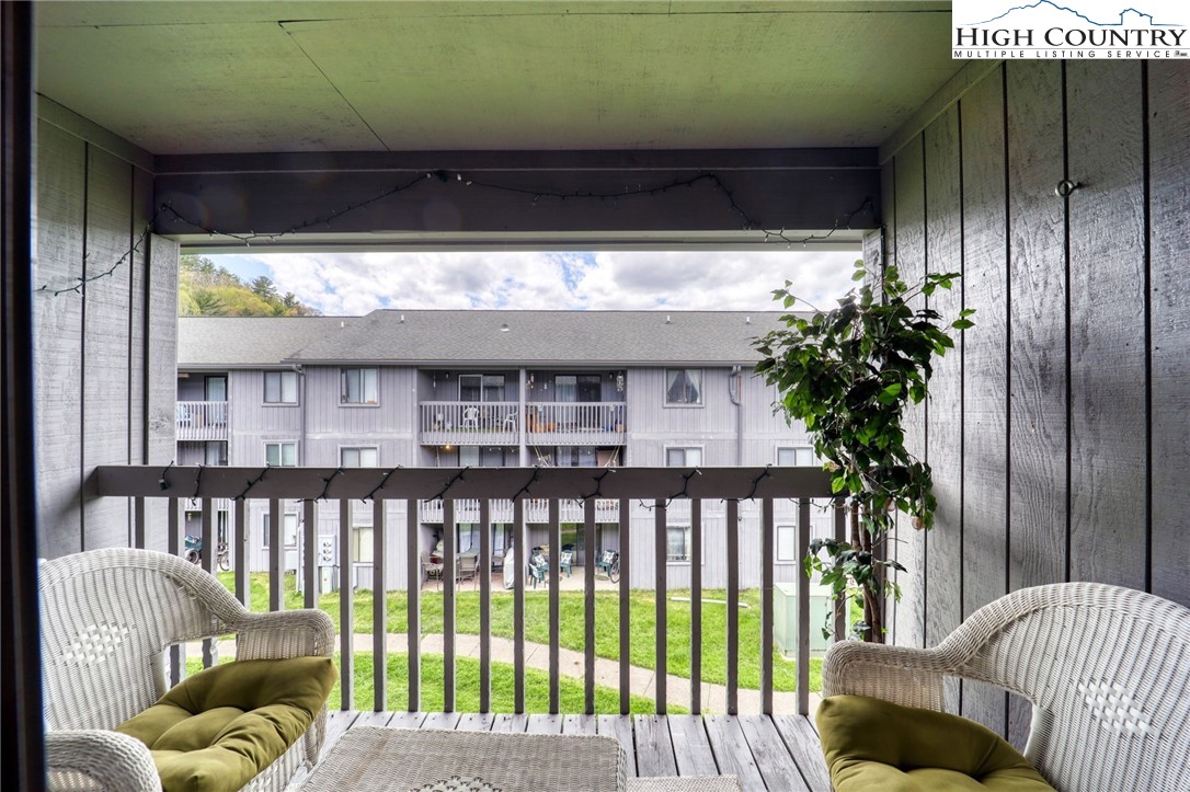 128 Zeb Street, Unit A304 Boone, NC 28607 - Photo 7 of 27 a view of a balcony with furniture
