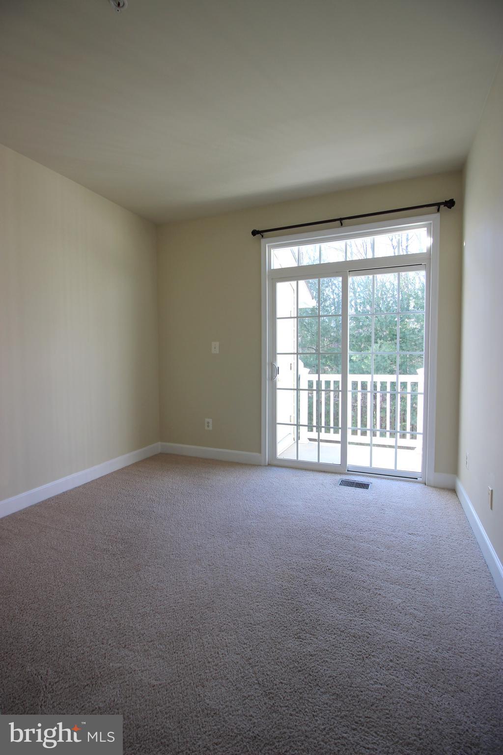 13608 Dover Cliffs Place Germantown, MD 20874 - Photo 12 of 32 a view of a big room with an empty room