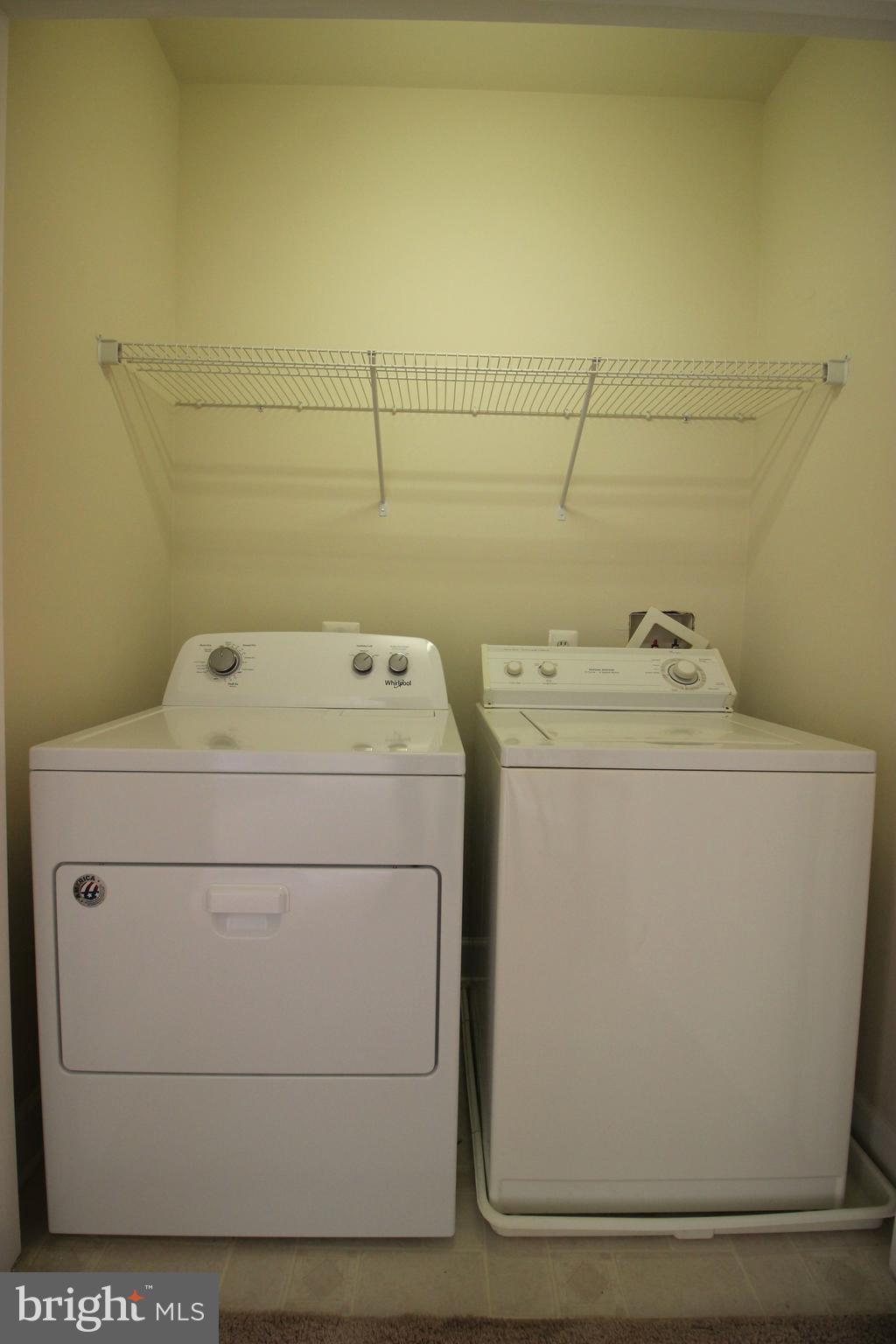 13608 Dover Cliffs Place Germantown, MD 20874 - Photo 28 of 32 a utility room with dryer and washer