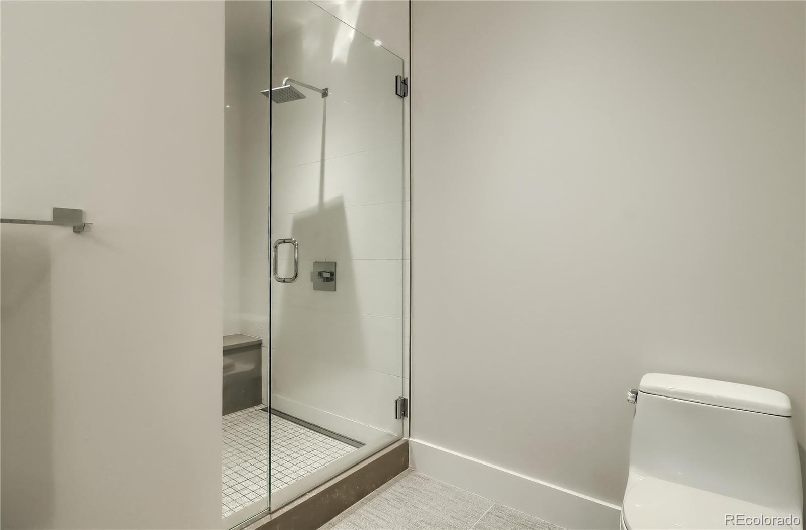 155 Steele Street, Unit 814 Denver, CO 80206 - Photo 21 of 39 a bathroom with a shower