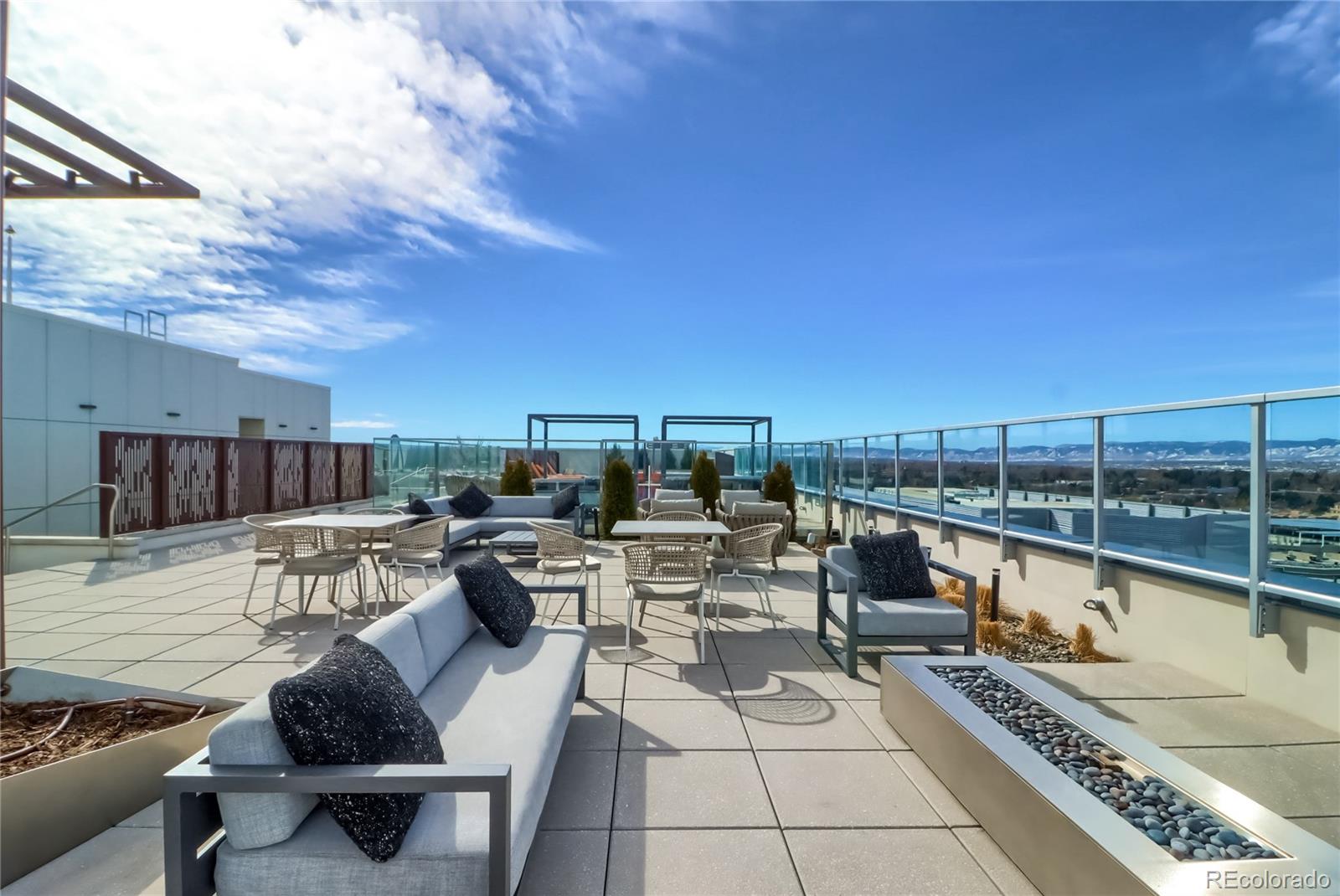 155 Steele Street, Unit 814 Denver, CO 80206 - Photo 29 of 39 a view of a terrace with furniture