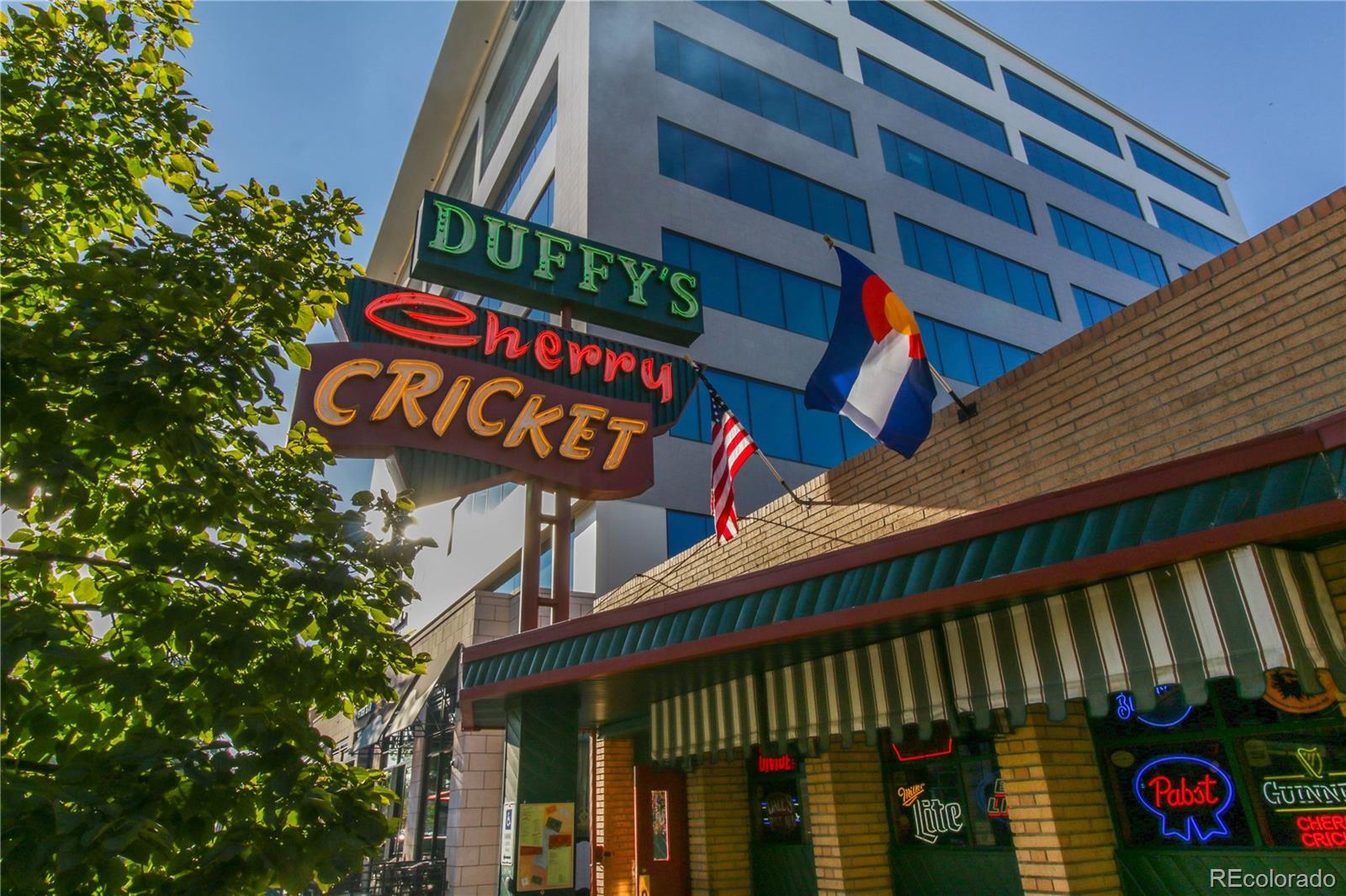 155 Steele Street, Unit 814 Denver, CO 80206 - Photo 34 of 39 a street sign on a street sign