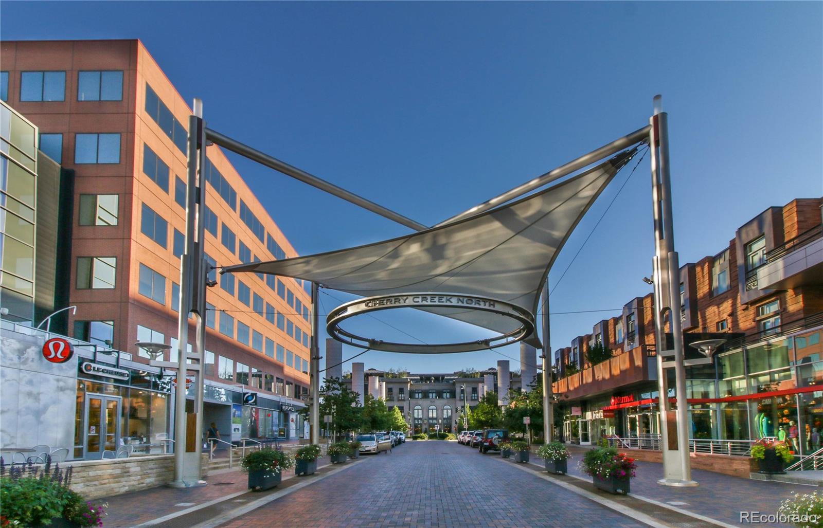 155 Steele Street, Unit 814 Denver, CO 80206 - Photo 36 of 39 a view of a building with a street