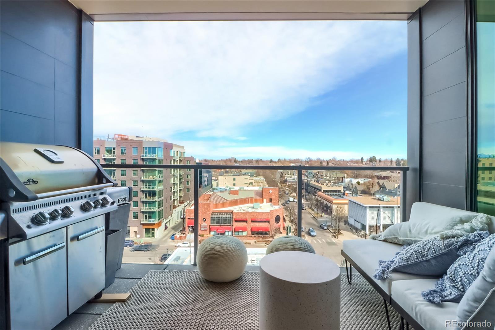 155 Steele Street, Unit 814 Denver, CO 80206 - Photo 6 of 39 a view of a living room and a window and fire pit