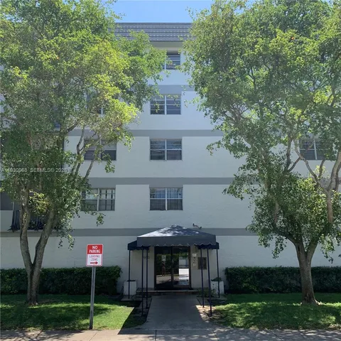 a view of a garden with a tree