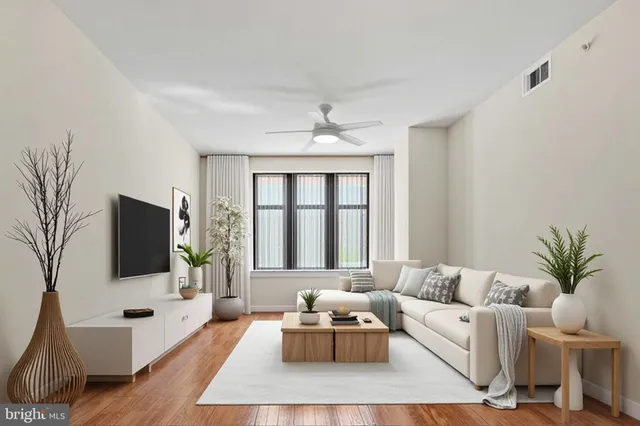 a front view of a building with many windows