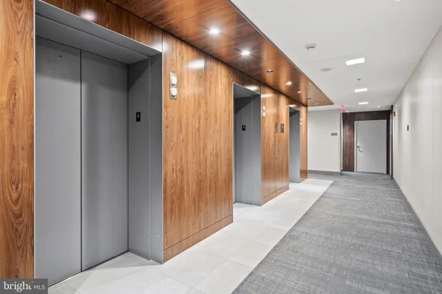 a view of a hallway with closet