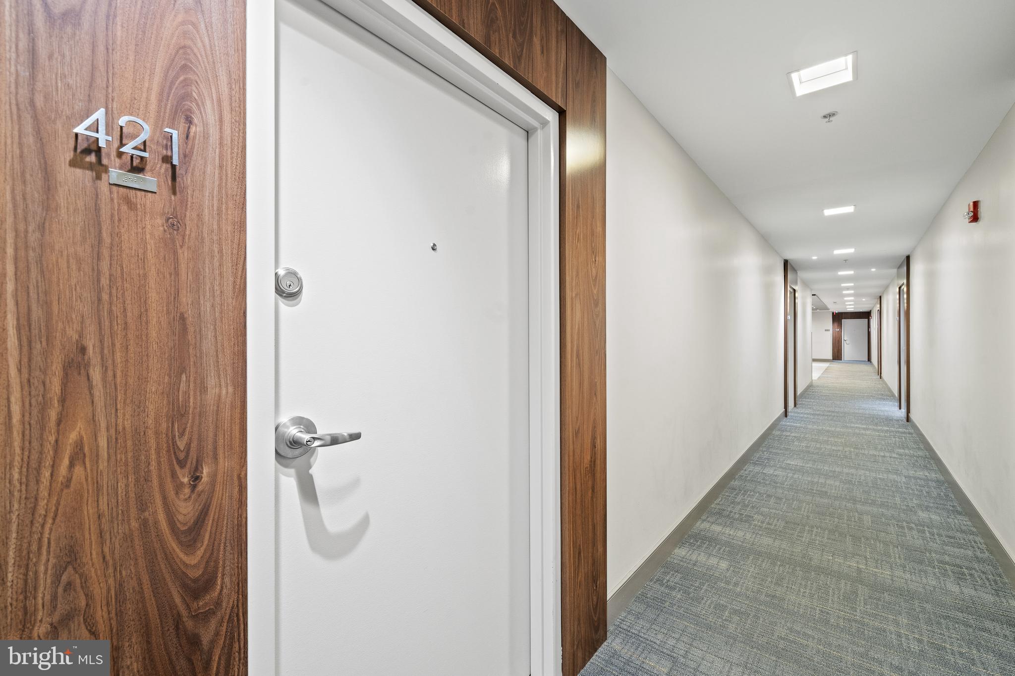 400 Massachusetts Avenue Northwest, Unit 421 Washington, DC 20001 - Photo 4 of 48 a view of a hallway with closet
